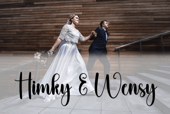 Disney Script Font-Handwritten Disney Script typography example on a cream background, showcasing unique letterforms for wedding stationery and elegant designs